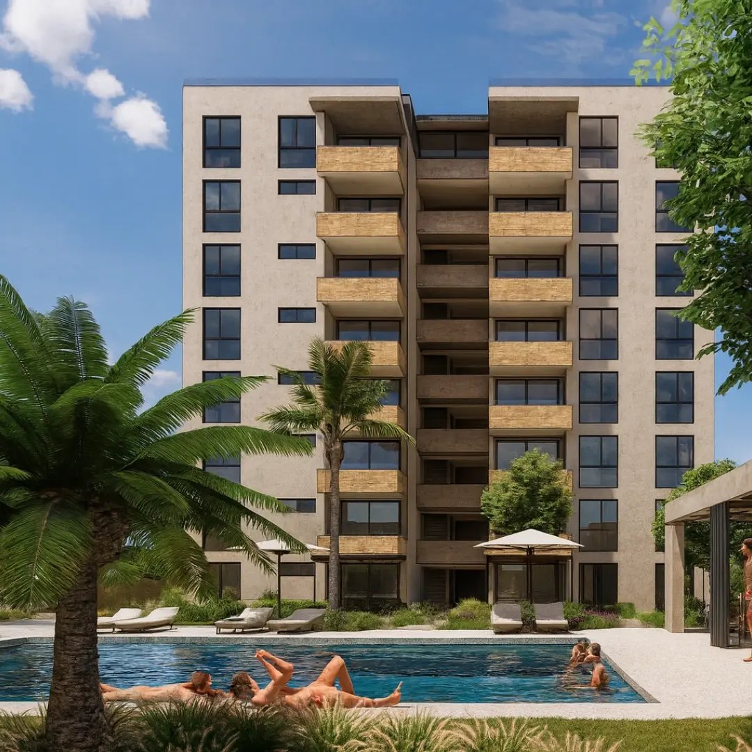 Departamento con acceso a alberca en Xochitepec, Morelos. Personas disfrutan del sol al rededor y en la alberca. Modelo Travertino